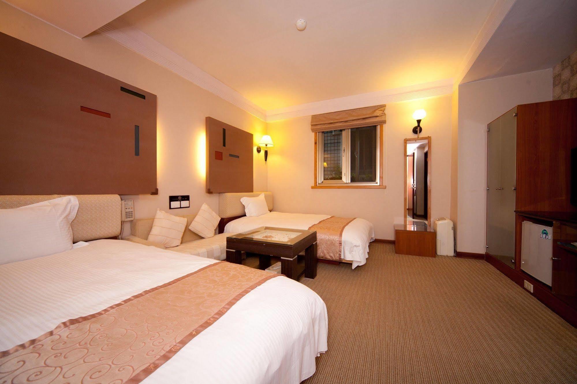 ג'יאושי Tian Long Hotel מראה חיצוני תמונה